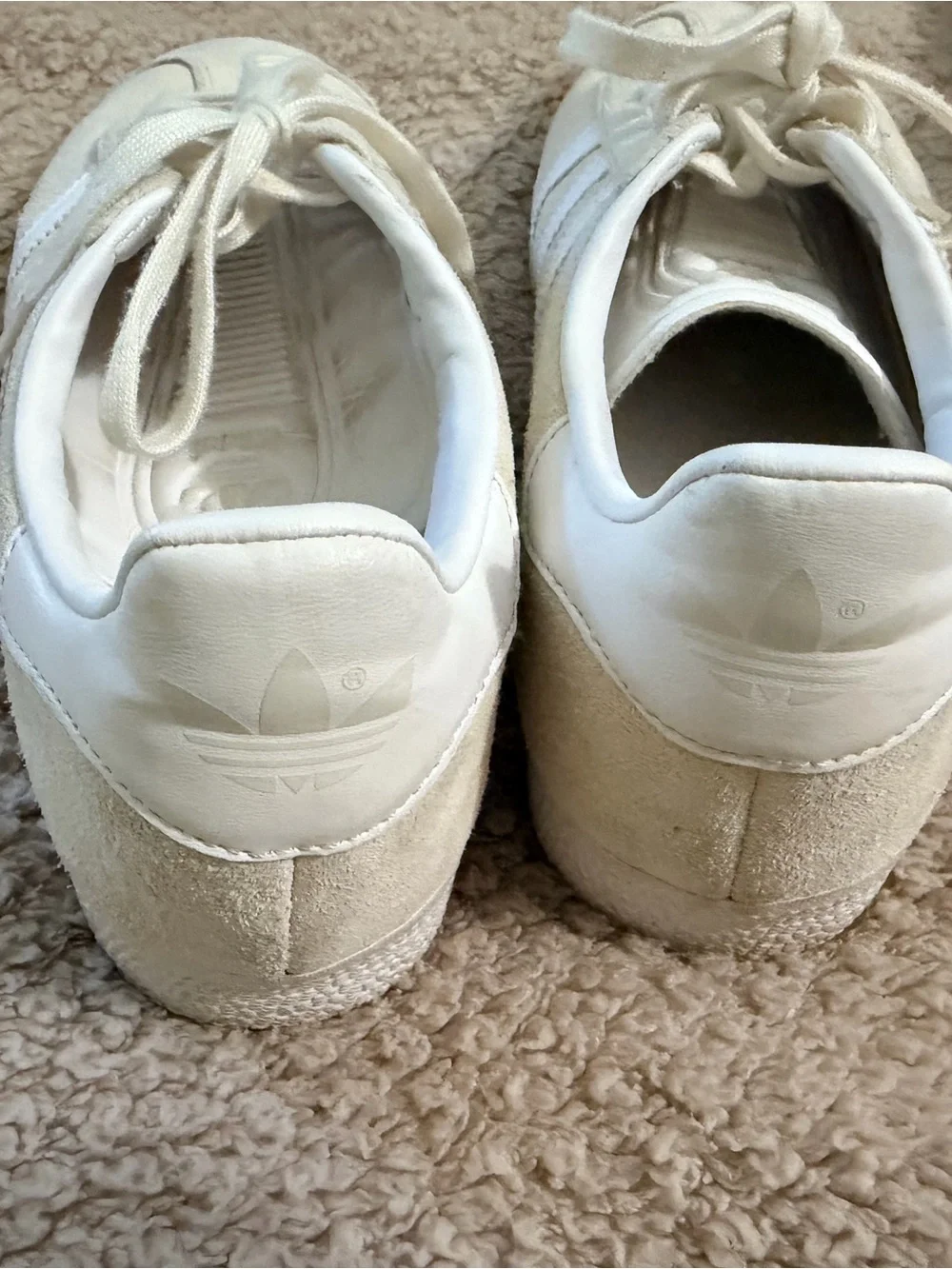 Women’s Adidas Gazelle sneakers in white/cream suede.